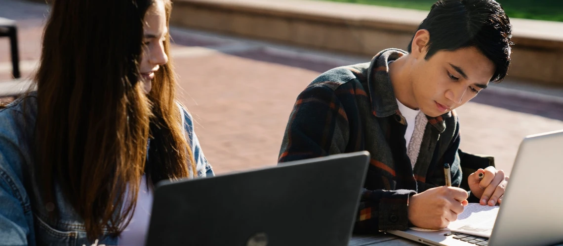 Two students are writing their dissertation in APA 7 format.